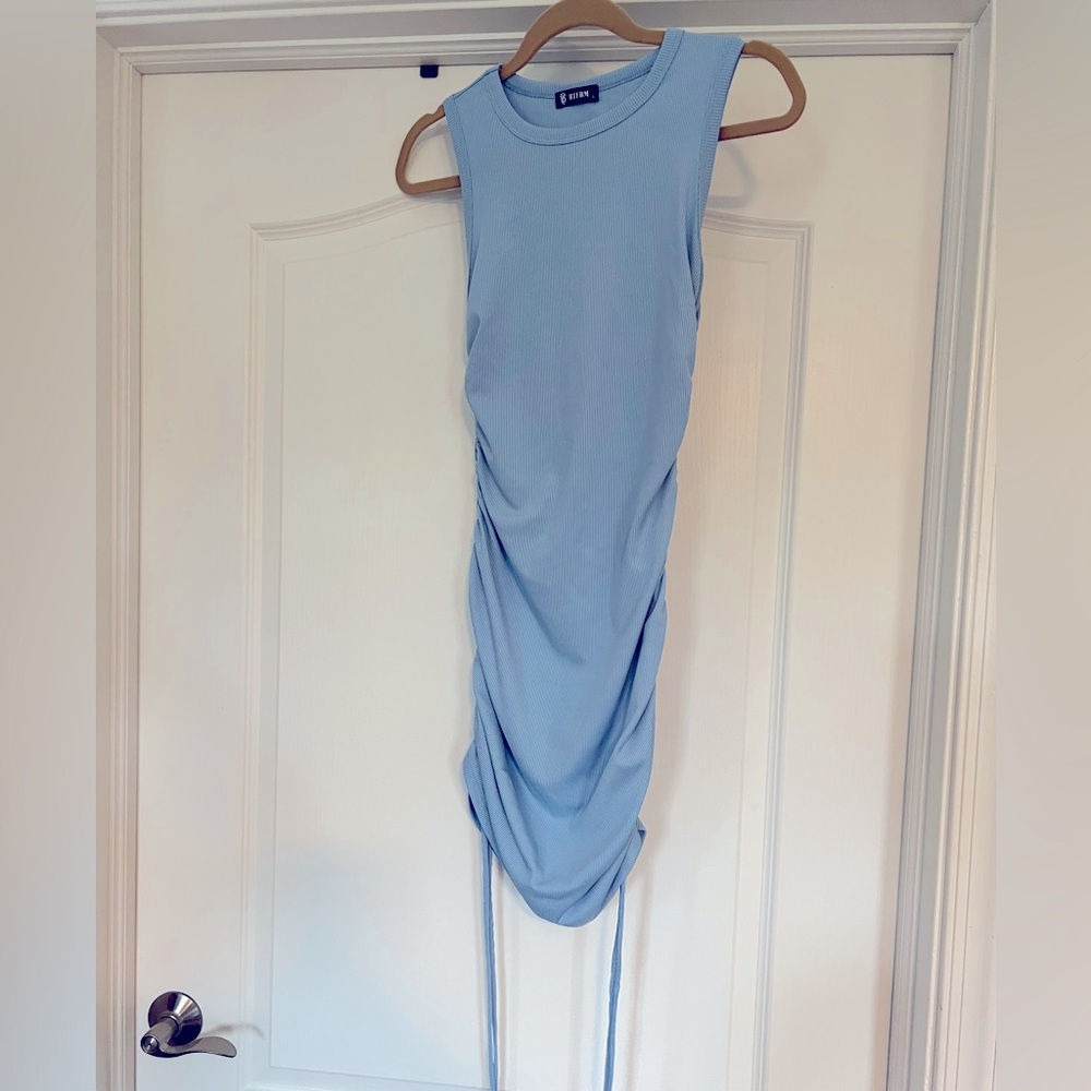 Light blue bodycon tie dress.